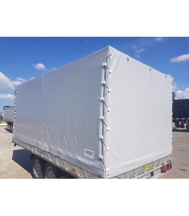 Telo in PVC da 650 gr/mq rinforzato e occhiellato su misura